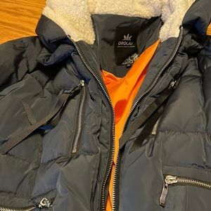 Orilay blue jacket looks like a puffer but it is very warm. Never worn